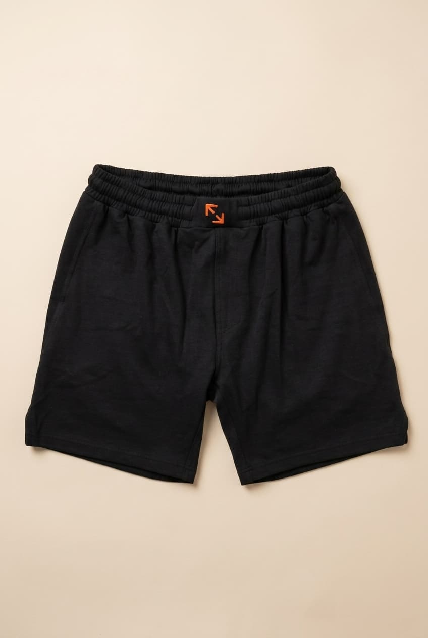 Fight Form Fight Short, front — black 6-inch organic cotton and Tencel competition short for MMA and BJJ.